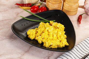 Scrambled egg in the bowl