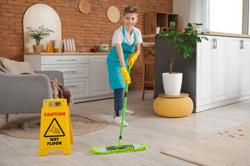 Teenage janitor with caution sign mopping floor at home