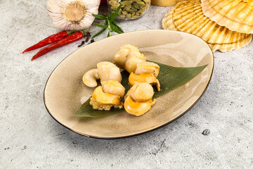 Delicous luxury baked seafood scallops