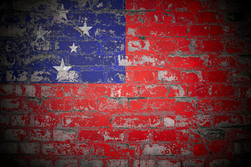 Flag of Samoa on brick wall