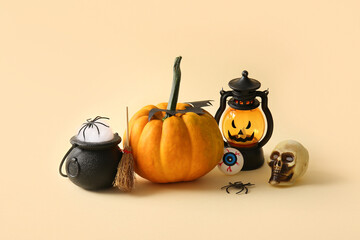 Composition with decorations and pumpkin on color background