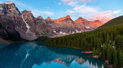 Majestic Mountain Lake Surrounded by Lush Forest and Peaks