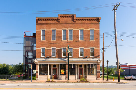 Homestead, PA - USA: The Bost Building on a sunny summer morning, bathed in sunlight, blue sky