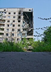 Destroyed apartment buildings due to war and shelling with rockets and artillery