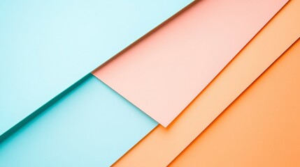 A composition of colored paper sheets in pastel tones arranged diagonally.