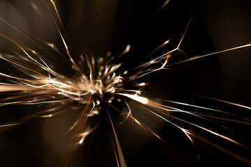 sparks from the grinder glowing in the dark
