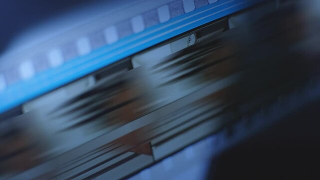 35mm Film strip in a cinema - close up shot film cels of a movie