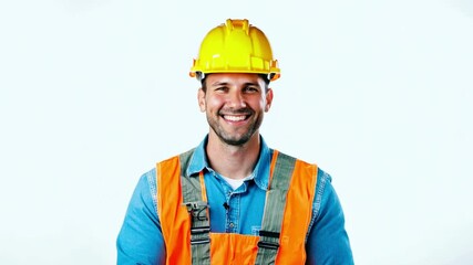Smiling construction worker in a hard hat and safety vest, looking into the camera against a pure white background
