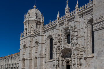 Fototapeta premium Jeronimos Monastery or Hieronymites Monastery (Mosteiro dos Jeronimos, 1601) - a monastery of Order of Saint Jerome in parish of Belem. UNESCO World Heritage Site. Lisbon, Portugal. 