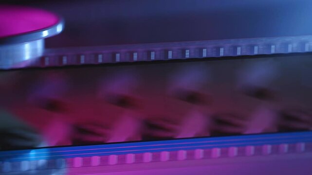35mm Film strip in a cinema - close up shot film cels of a movie