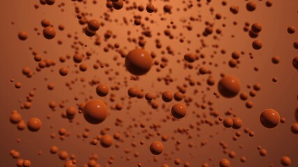 Particles suspended in a warm brown background create a mesmerizing visual effect in an abstract representation of motion