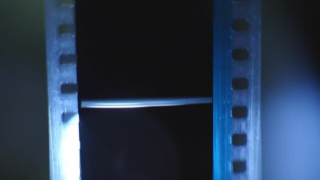 35mm Film strip in a cinema - close up shot film cels of a movie
