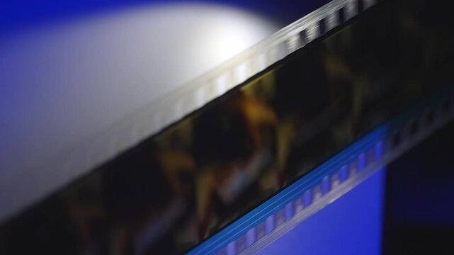 35mm Film strip in a cinema - close up shot film cels of a movie