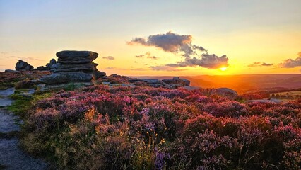Stunning sunset over Hope Valley from Surprise View, showcasing Millstone Edge and Owler Tor, with...