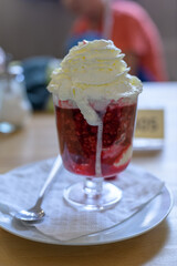Warm, oozing raspberries with whipped cream.