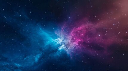 Obraz premium A mesmerizing view of a nebula showcasing vibrant blue and pink colors against a starry background, perfect for cosmic themes.