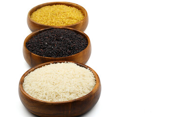 Different sorts of rice on isolated white background, flat lay. Space for text