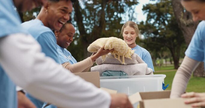 Volunteer, people and package with donation in nature for community service, outreach and NGO project. Happy, team and box with toiletries in park for social responsibility, charity and hygiene kit