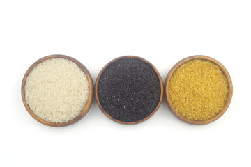 Different sorts of rice on isolated white background, flat lay. Space for text