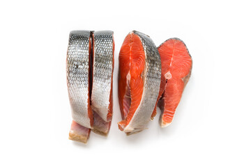 Isolated salmon fish. Uncooked salmon steak with ingredients for cooking. Top view