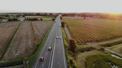 traffic on the highway sore hari ditengah sawah