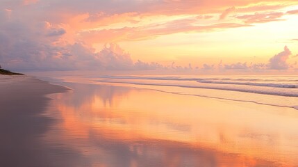 Fototapeta premium Golden Sunset Over Calm Ocean Beach