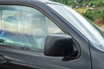Fototapeta premium Side rear-view mirror on a car