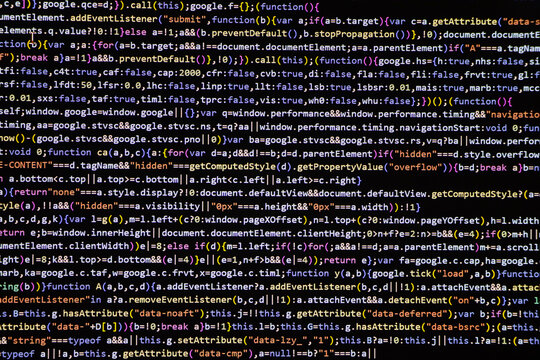 Software source code. Programming code. Programming code on computer screen. Developer working on program codes in office. Source code