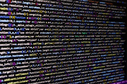 Software source code. Programming code. Programming code on computer screen. Developer working on program codes in office. Source code