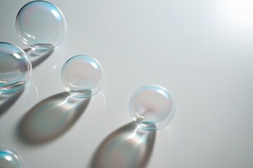 Fototapeta premium Glossy Soap Bubbles on Stark White Surface with Radiant Sheen and Lucid Outline