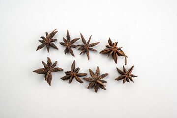 A close up of a bunch of dried up star anise