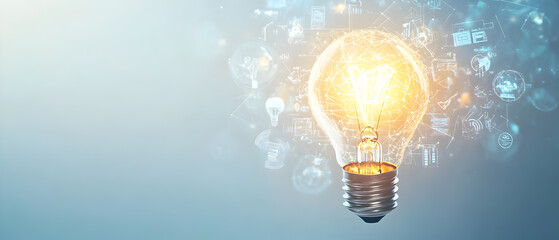 Glowing light bulb with swirling icons around it, representing innovation and inspiration.