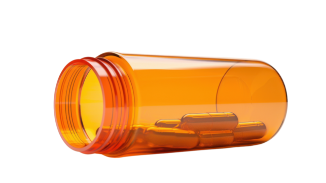 Orange capsules isolated on white background