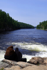 Two female tourists enjoying the beauty of Ontario's northern wilderness