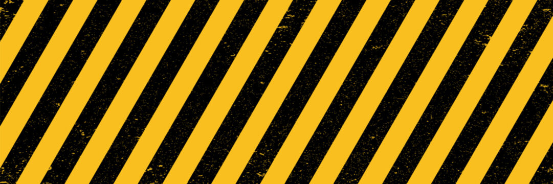 Warning safety yellow black diagonal stripes line caution hazard danger road sign symbol.