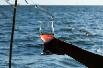 glass of cocktail on the beach