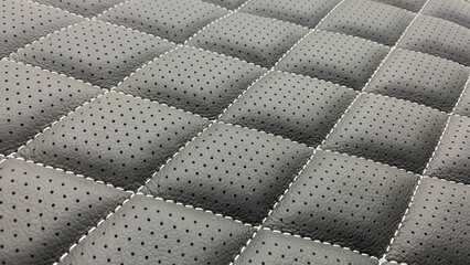 Black leather with thread diamond pattern  background or texture