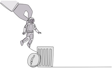Single continuous line drawing astronaut is lifted by a giant hand will be put into trash can. Destroyer of space expedition mission plans. Cosmonaut outer space. One line design vector illustration