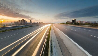 Fototapeta premium wide angle photo of a city road with a speed blur in the evening.transportation, freeway, drive, transport, way, driving, 