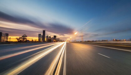 wide angle photo of a city road with a speed blur in the evening.road, highway, sky, travel, landscape, asphalt, sunset