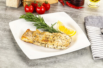 Baked salmon fish served rosemary