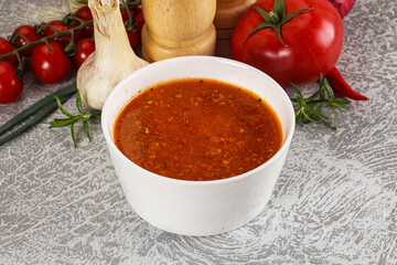 Hot tomato soup with diced chicken