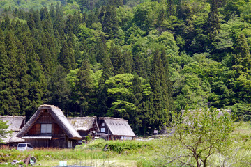 Gassho-zukuri, a special building located in Shirakawa Township, Japan. The Gasshō-style house is characterized by a steeply slanting thatched roof, resembling two hands joined in prayer.