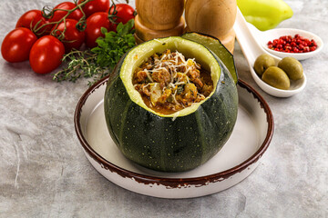 Baked round zucchini with meat