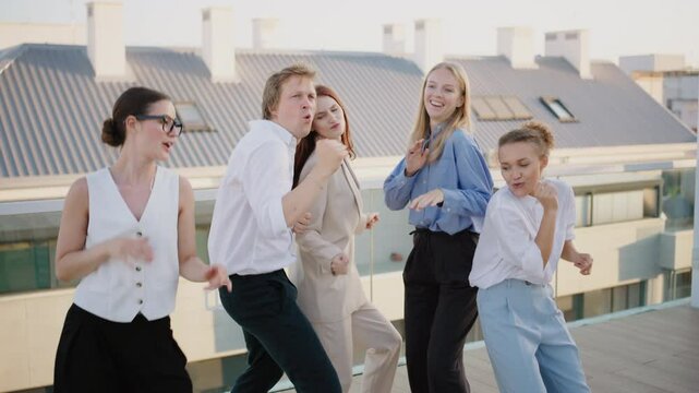 A vibrant and dynamic group of young professionals, joyfully celebrating their teamwork and remarkable success in a modern rooftop office setting, embodying a strong spirit of collaboration and unity