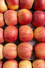 Lots of red apples. Tasty and juicy. Background of apples. High quality photo