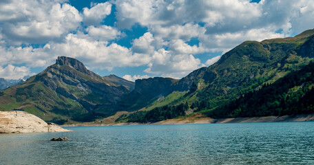 A beautiful mountain range with a lake in the foreground