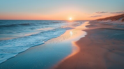 Golden Sunset Over Calm Ocean Waves and Sandy Beach