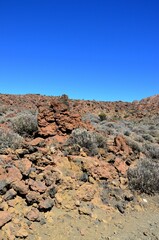 Scenic view of volcanic rock formations in desert during sunny day, Teide National Park, Tenerife