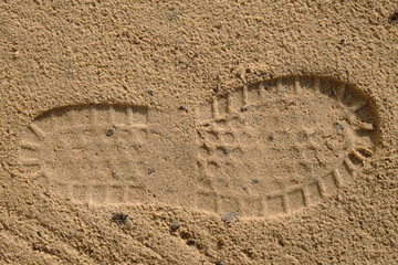 Footprint in the sand forensics, three-dimensional visible trace left at the scene of the crime, forensic examination of traces